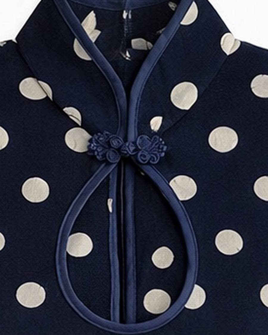 Yumeji Dalmata Dress, Long Sleeve, collar and fastening in close up