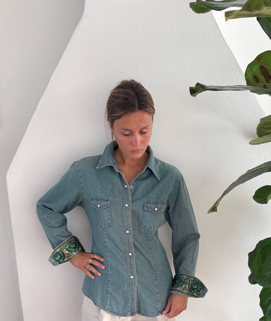 Denim shirt with patches on the sleeves and on the back