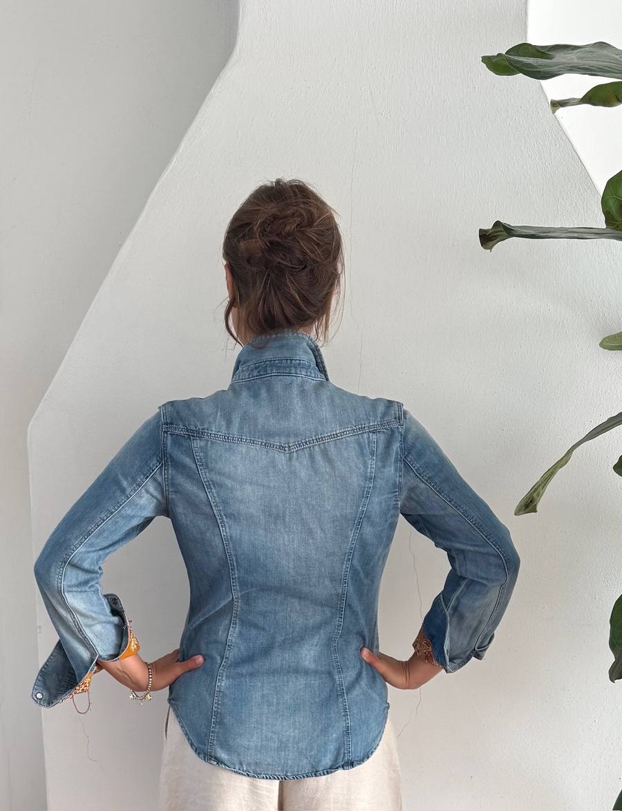 Denim shirt with patches on the sleeves