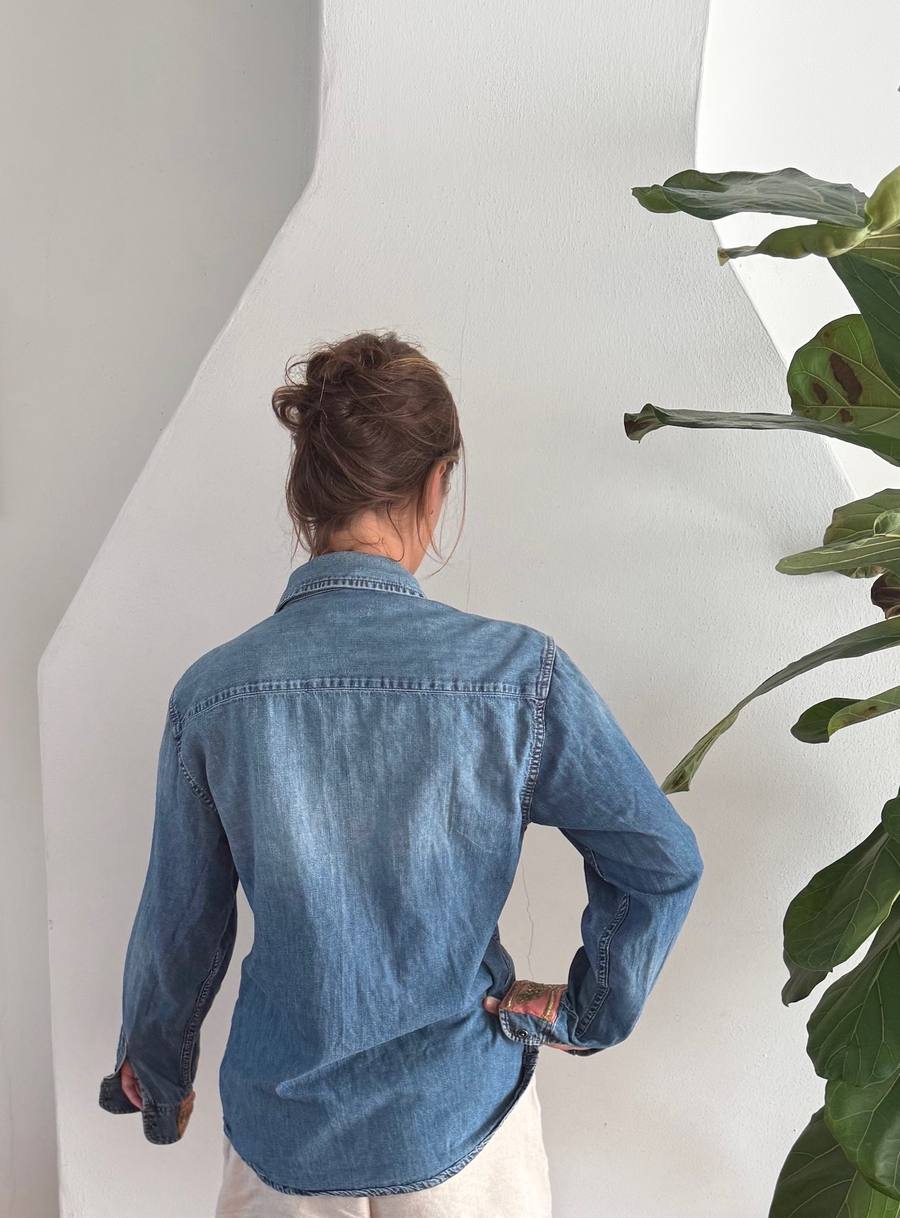 Denim shirt with patches on the sleeves